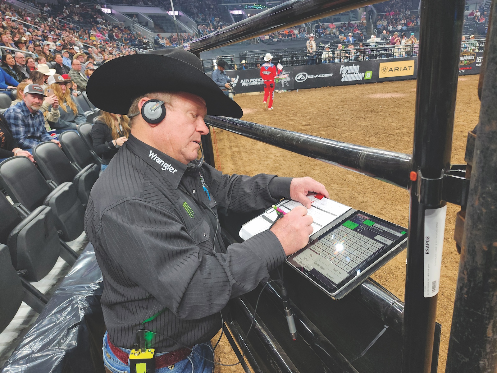 Allan Jordan writing the score for a bull ride