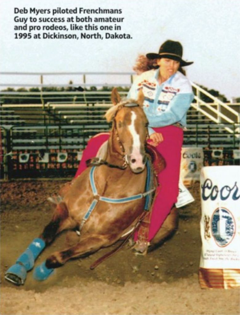 Deb Myers running the stallion in barrels.