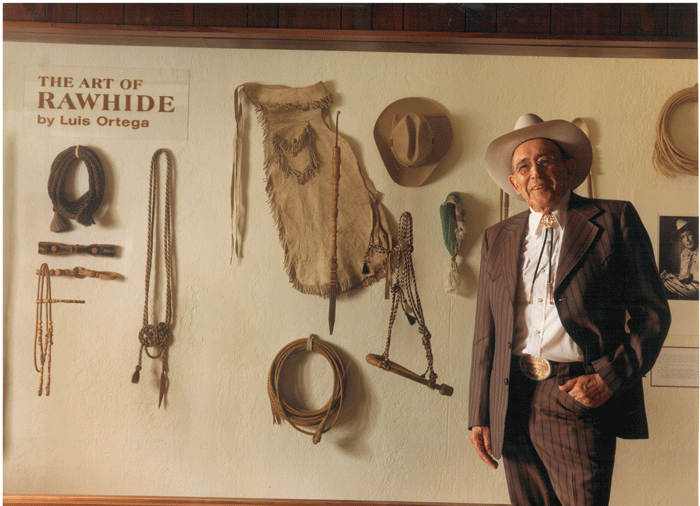 Luis-in-front-of-rawhide-display web