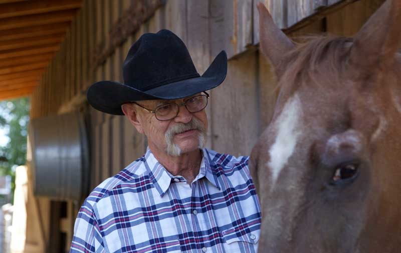 Sculptor Bill Nebeker of Prescott, Arizona, and his retired roping horse, Bugs.