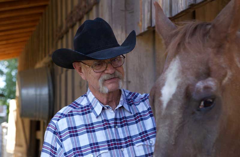 Sculptor Bill Nebeker of Prescott, Arizona, and his retired roping horse, Bugs.