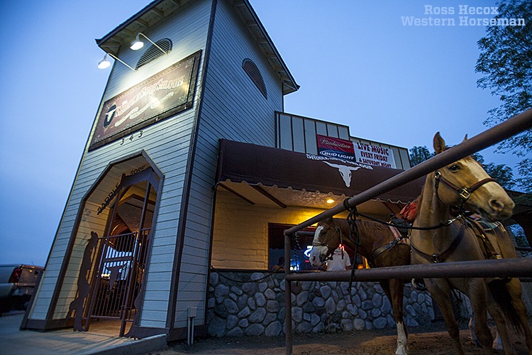 Outside a bar in Norco, California, two horses wait to escort their riders safely home. The community east of Los Angeles is one of the most horse-friendly towns in the United States, with hitching rails in front of most business, horseback lanes along the streets, and trails that criss-cross in and out of the city limits.