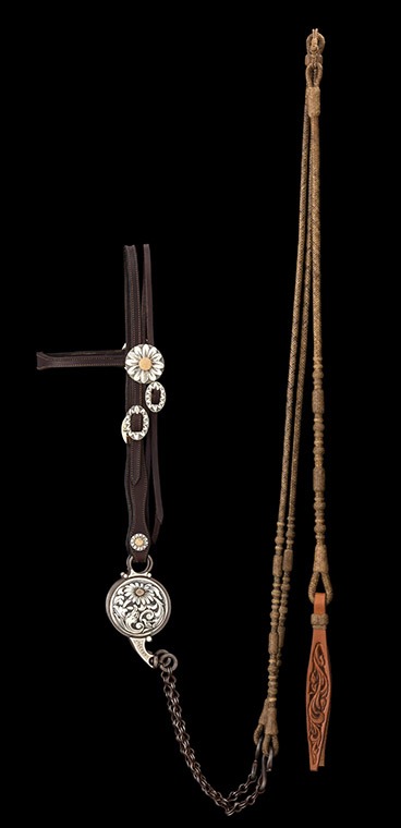 Silversmiths Wilson Capron and Scott Hardy created silver for the saddle and bridle, and Leland Hensley braided the rawhide reins and romal.