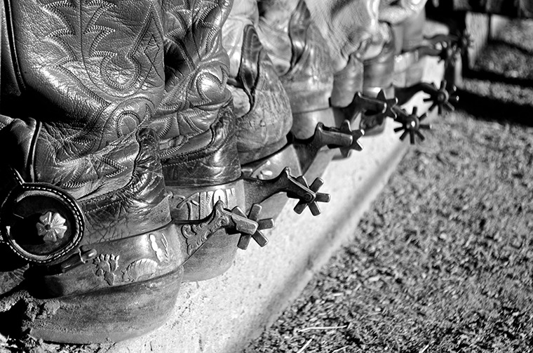 Kelli Neubert wears spurs with an armadillo and cacti on the heel band. Photo by Kellie Neubert.