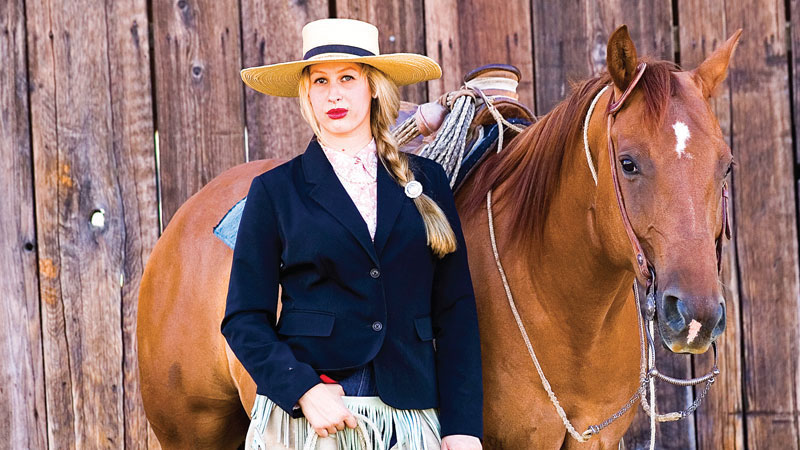 Liz Brannan standing next to horse