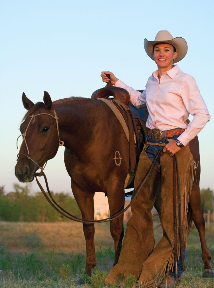 Heather Stiles standing by horse
