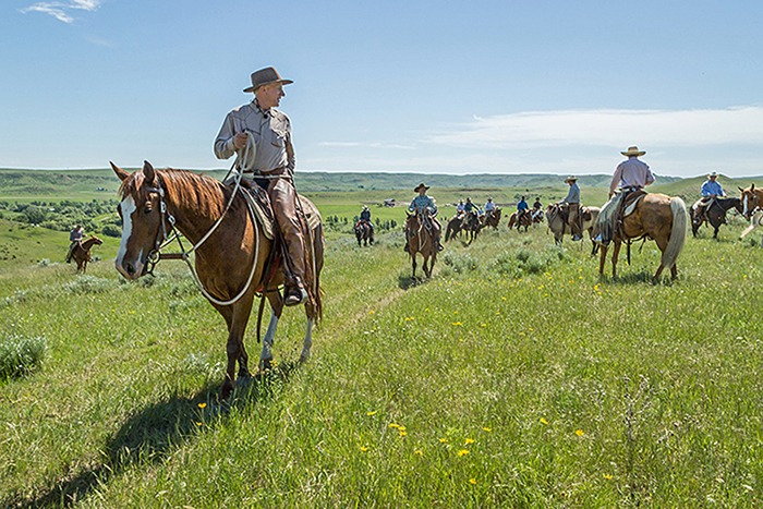 On the fourth and final day, Brannaman takes clinic participants and their young horses to the hills and open country of Houlihan Ranch.