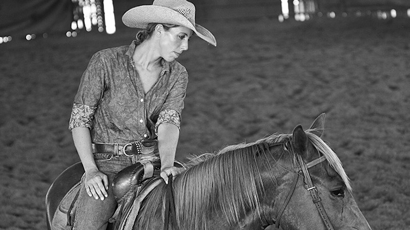 Kelli Neubert riding a horse illustrating the rider horse dynamic