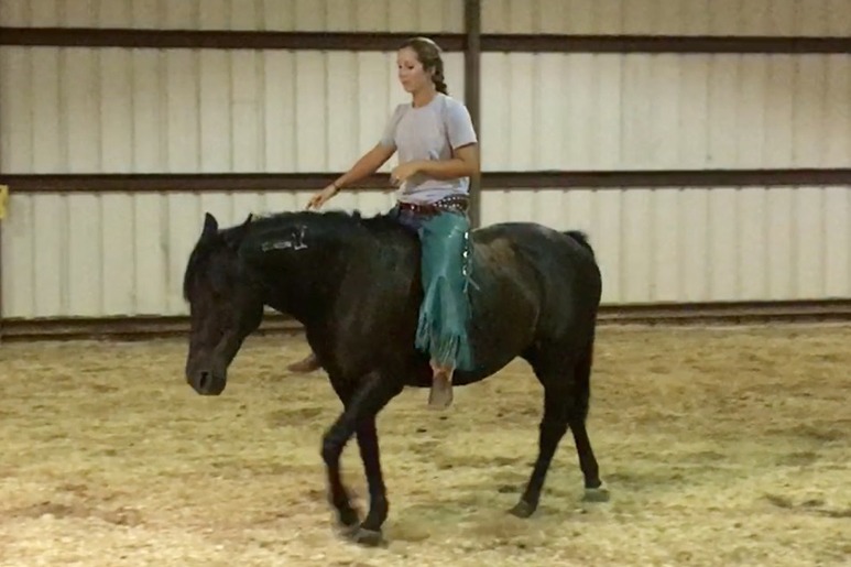 Shelby Crider riding bareback on mustang Pearl