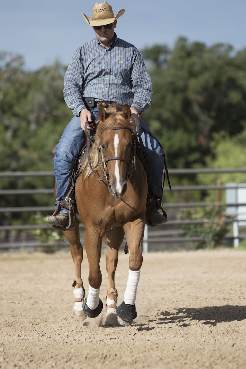 Trey Pool loping on horse