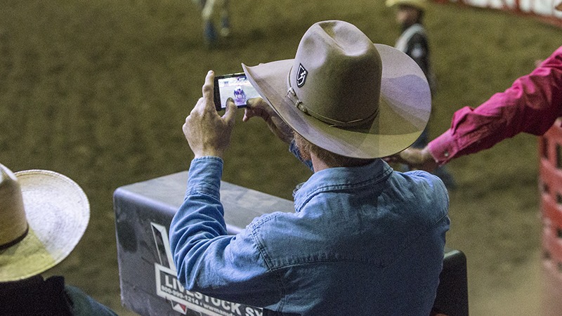 cowboy recording rodeo cell phone