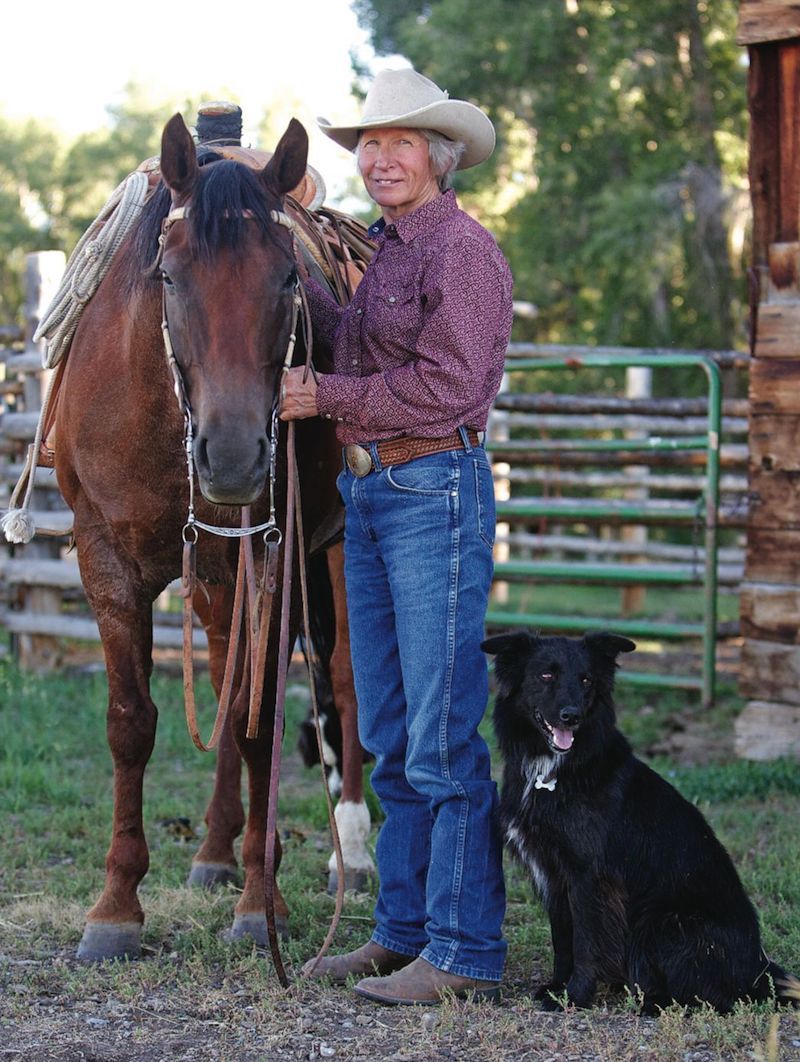 Dianne Boroff standing with horse and dog