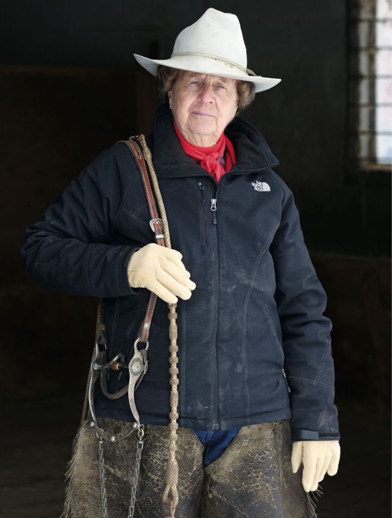 Merilyn Sustacha standing with bridle on shoulder