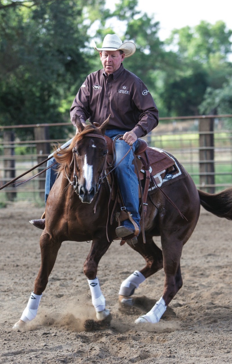 Ron Emmons turns horse by planting its back leg