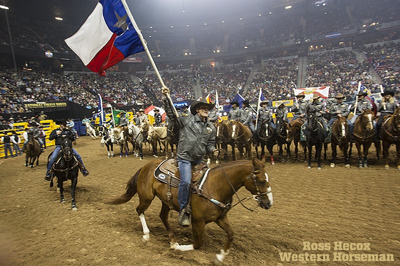 Tuf Cooper carrying the Texas Flag during the grand entry at the NFR