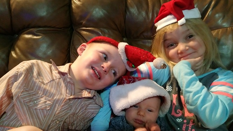 ranch kids wearing santa hats