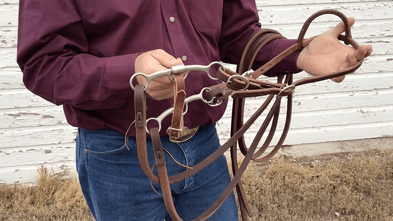 Ken McNabb holding a Weaver Leather lifter bit