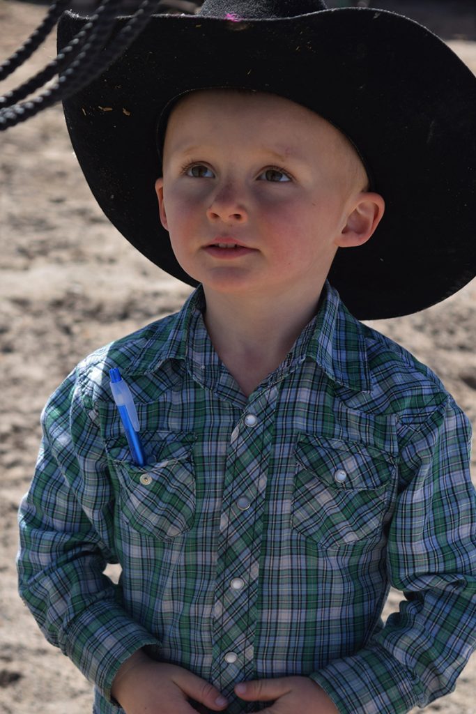 little cowboy with pen in his pocket