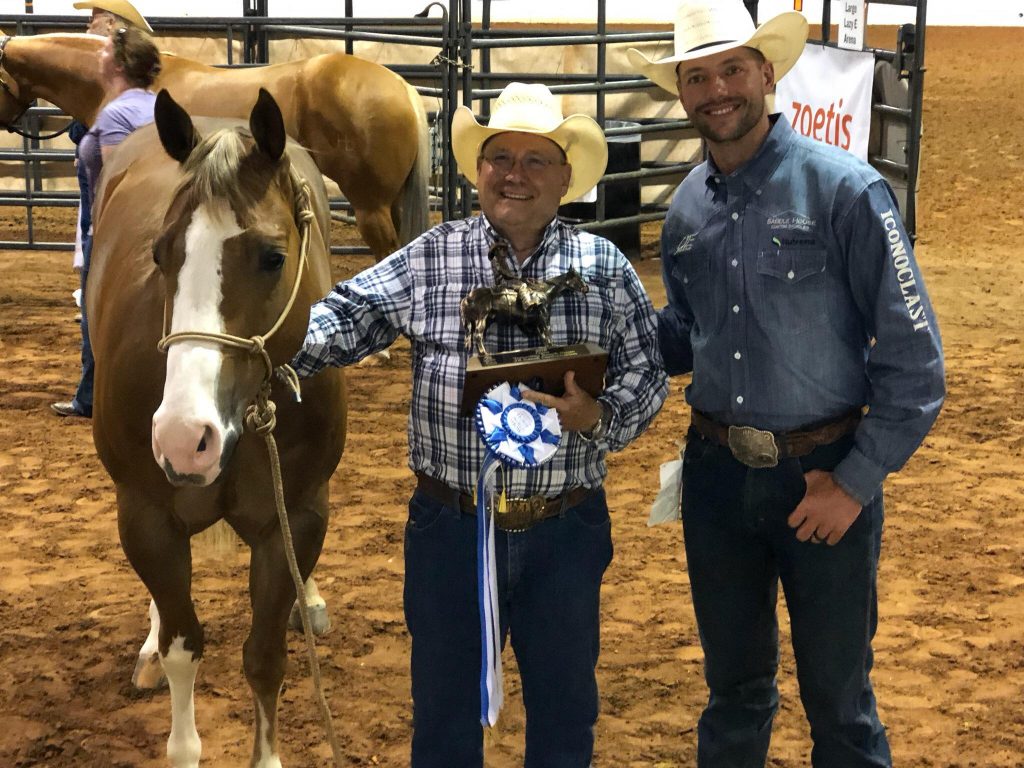 Seven S Woodrow standing with owner Jerry Ward and trainer Ben Baldus.