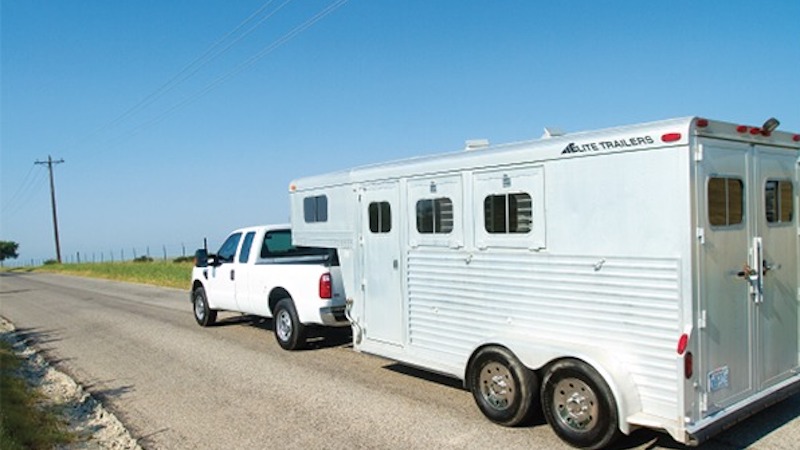 truck pulling horse trailer