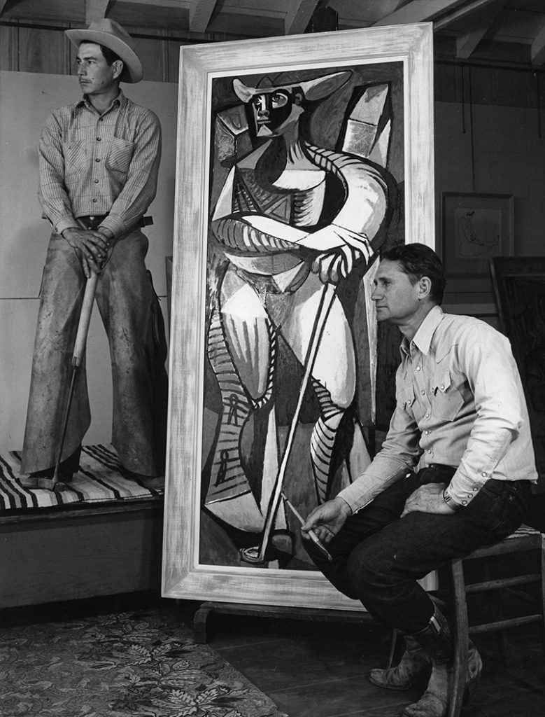 Peake in his studio with a cowboy model