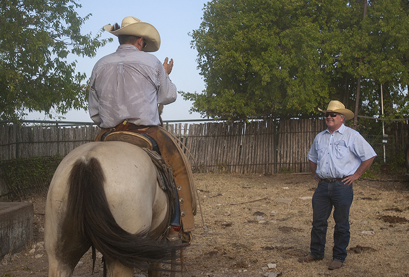 Eddie Thompson talks with Ed Farmer Beggs, who manages the Beggs family operations