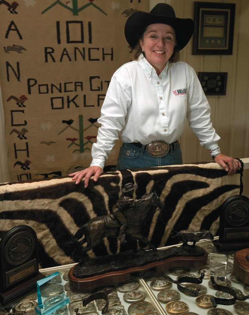 Jimmie Gibbs-Munroe standing with buckle case