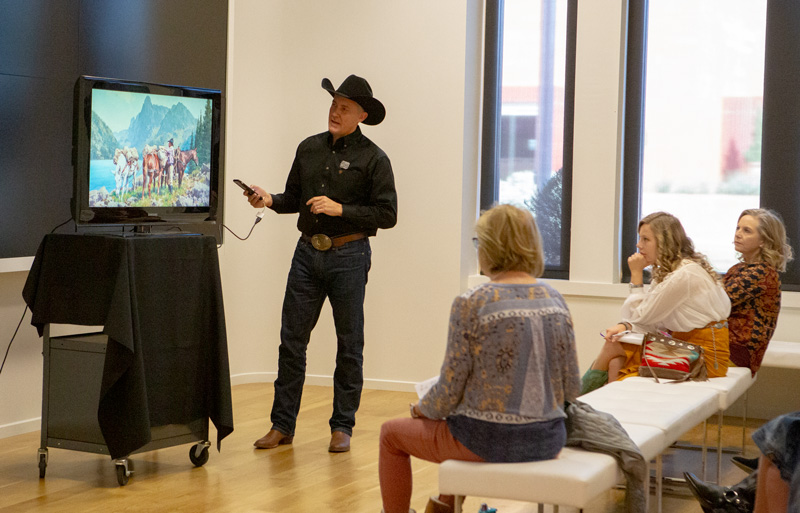 Cowboy artist Jason Rich gives a presentation at the CA Sale