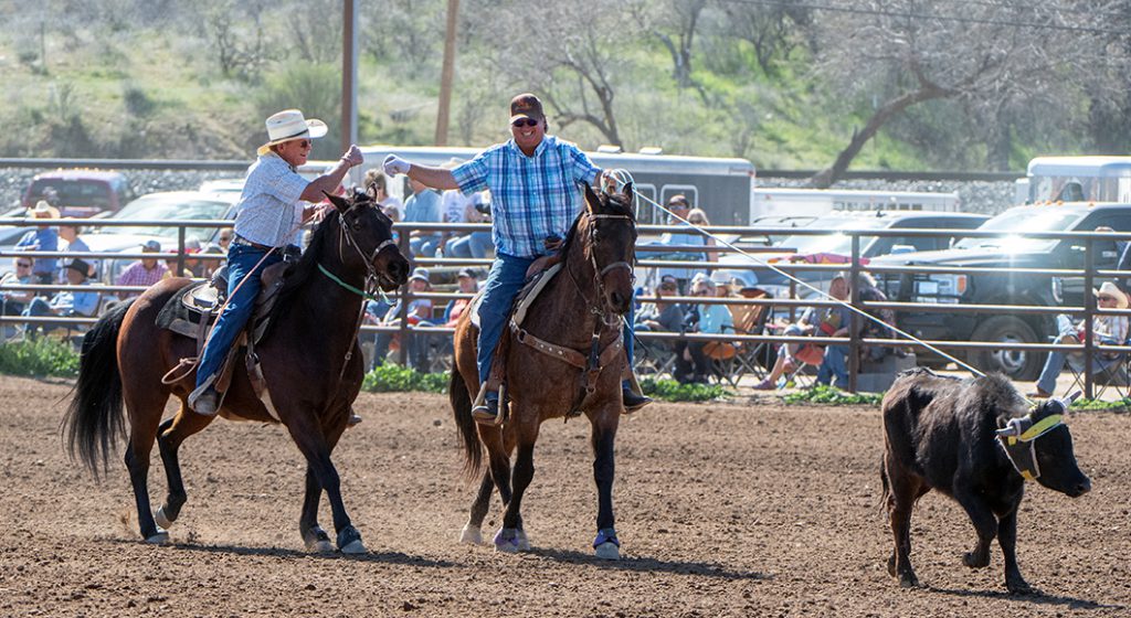 Fenster and Surber give knuckles at Sunshine Classic.