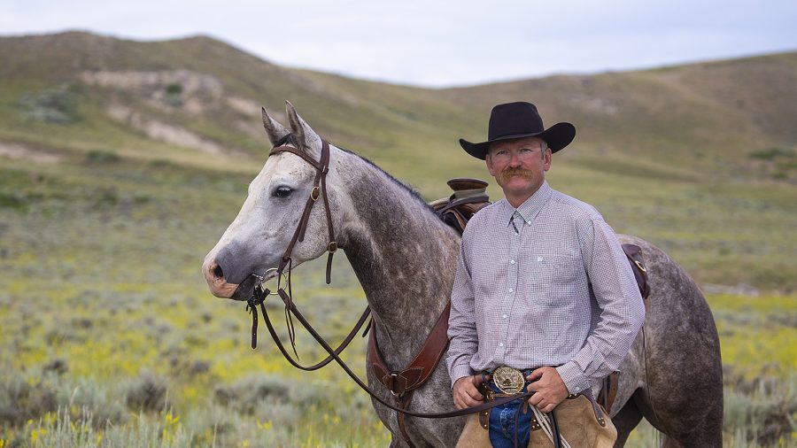 Kevin Meyer standing with horse