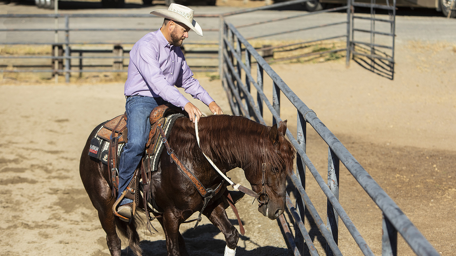 Clayton Edsall demonstrating how to use a fence to get a horse to stop and roll back
