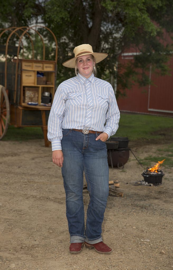 Jessica Casteel cooks from a chuckwagon.