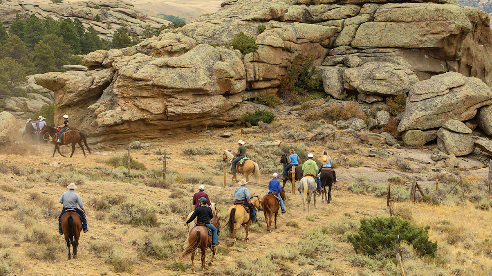 trail riders taking a dude ranch vacation
