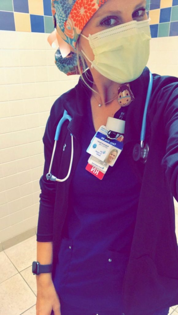 Tacy Kay working as an ICU nurse.
