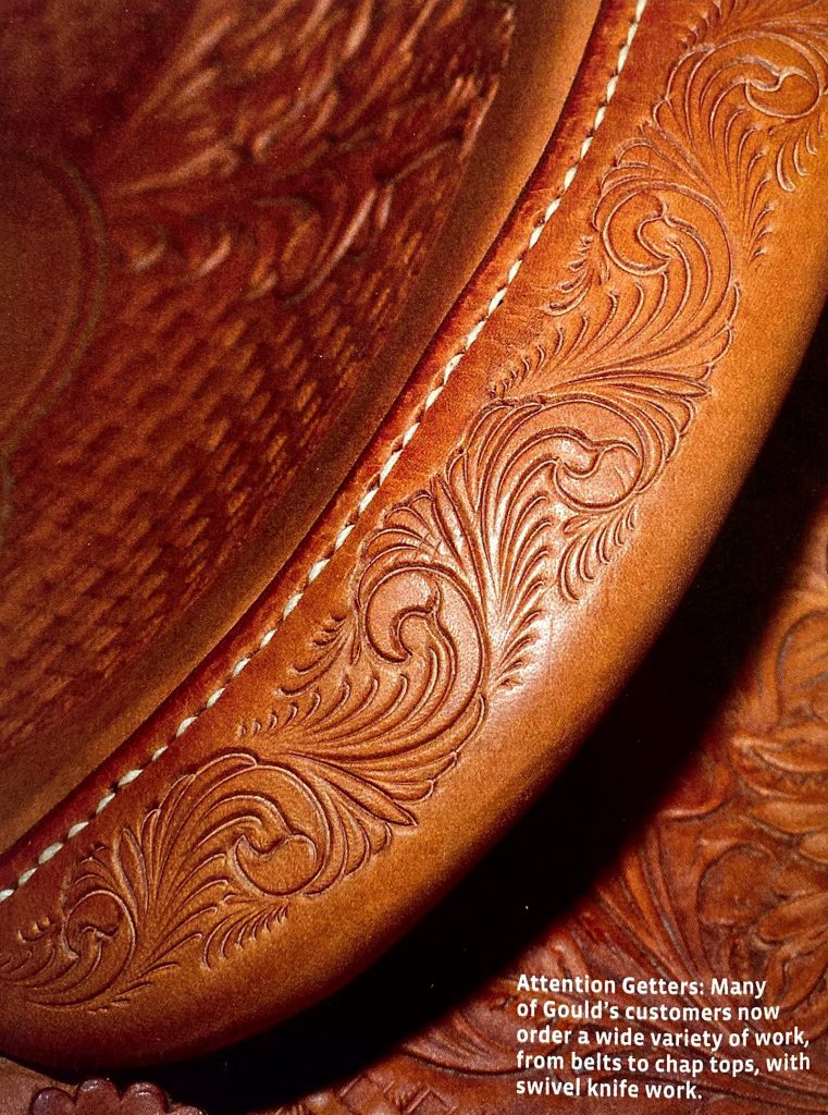 Detailed photo of swivel knife design work on a saddle cantle.
