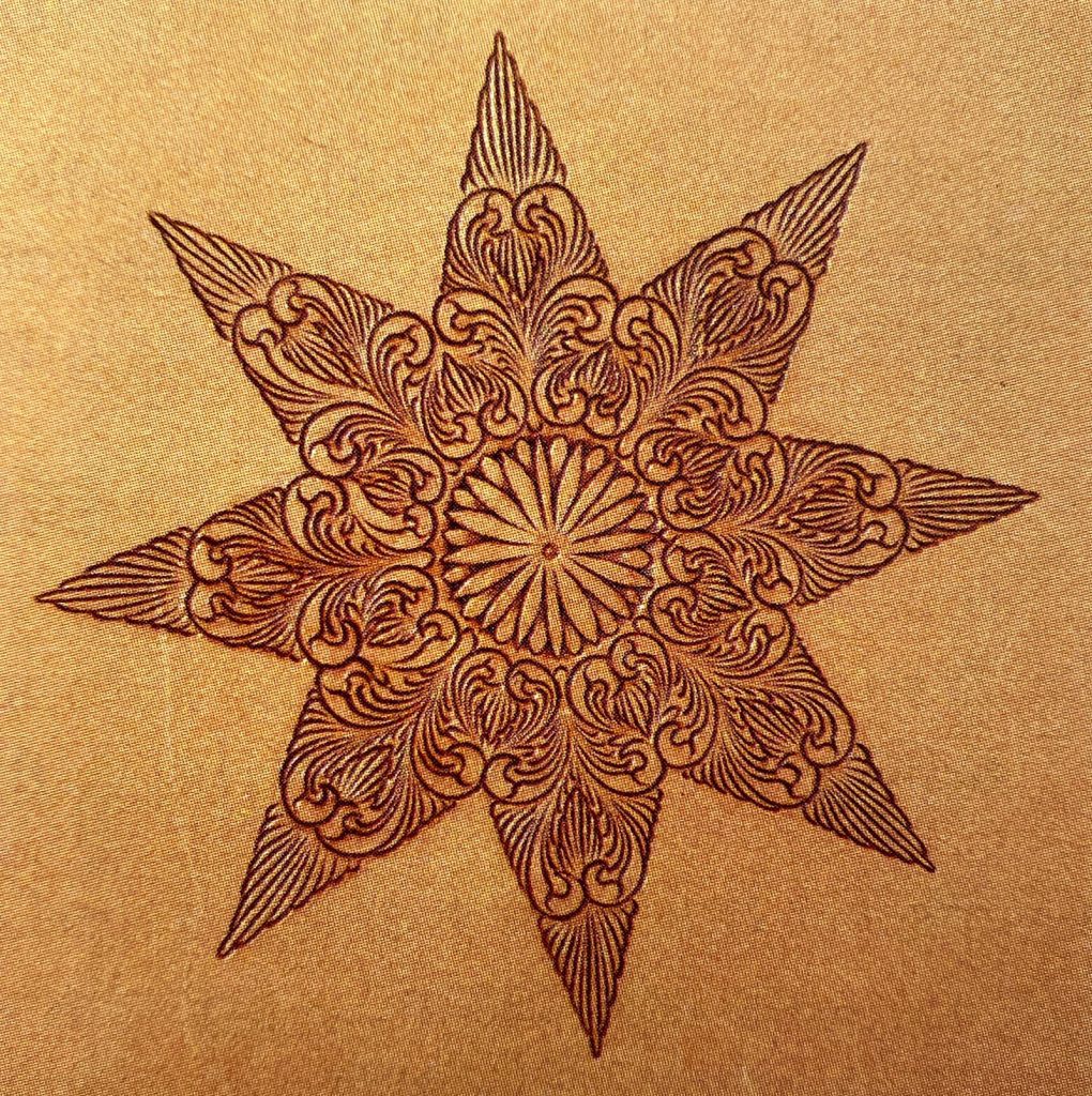 Al Gould uses this cowboy mandala to show swivel knife techniques.