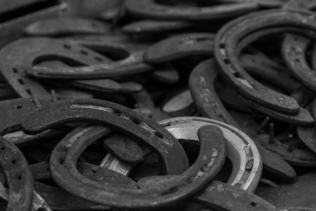 Western culture is superstitious about the way horseshoes are hung on a wall.