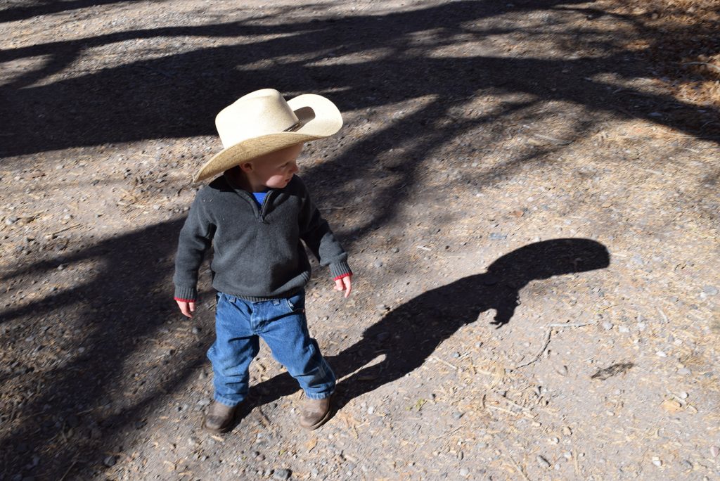 Little cowboy Levi Young wears Western wear every day.
