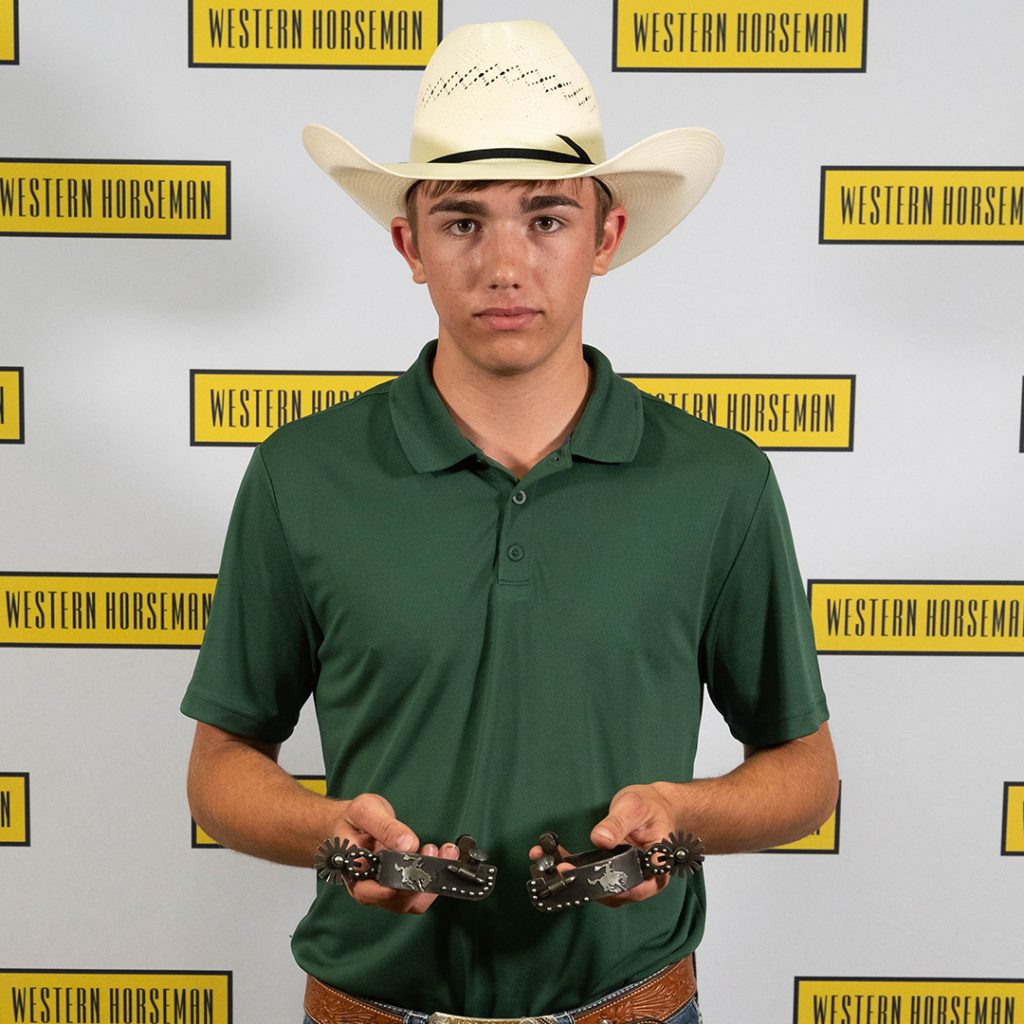 Tyler Porter holding his spurs.