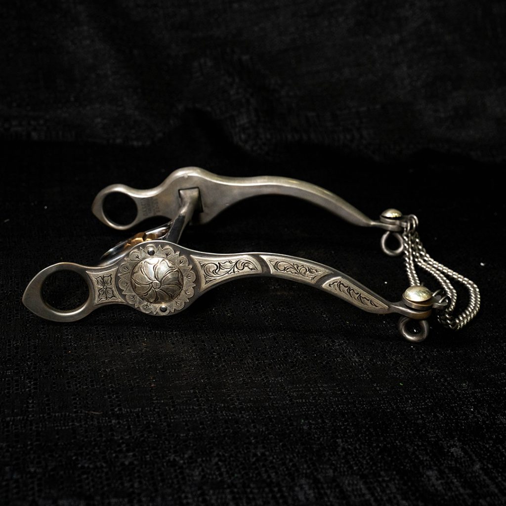 Engraved bit on black background.