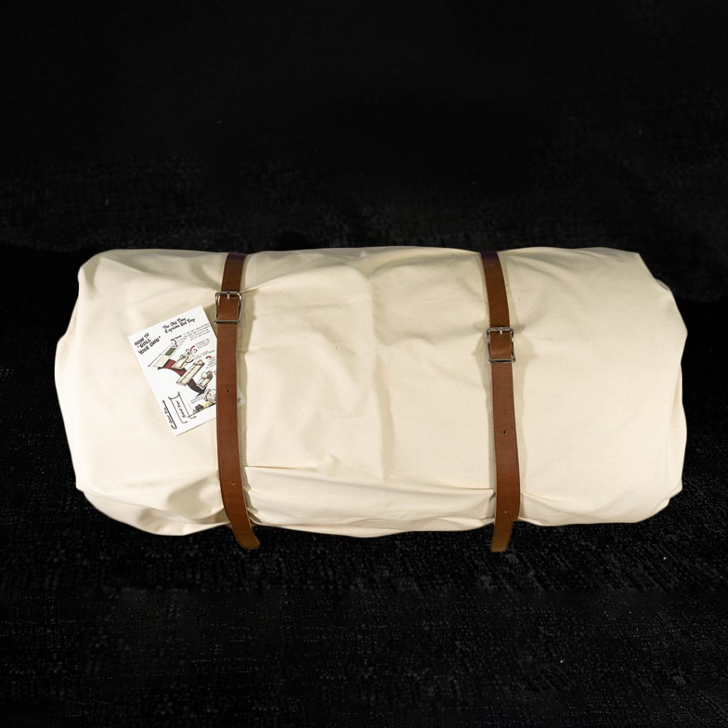 A bedroll on a black background.