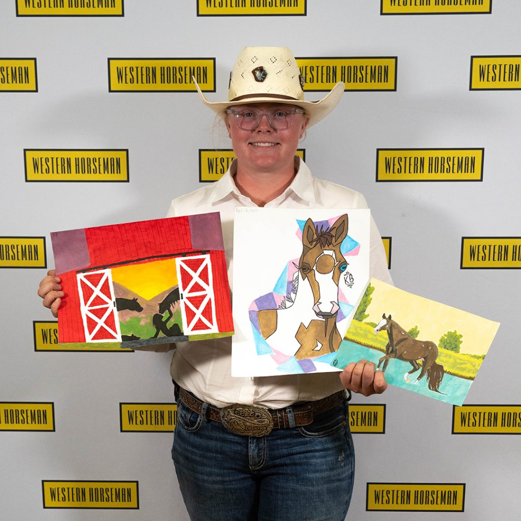 Taylor Jones holding her paintings for the 2023 Western Lifestyle Trade Craft Showcase.