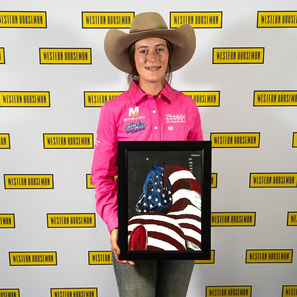 Tava Sexton with her painting of a horse.