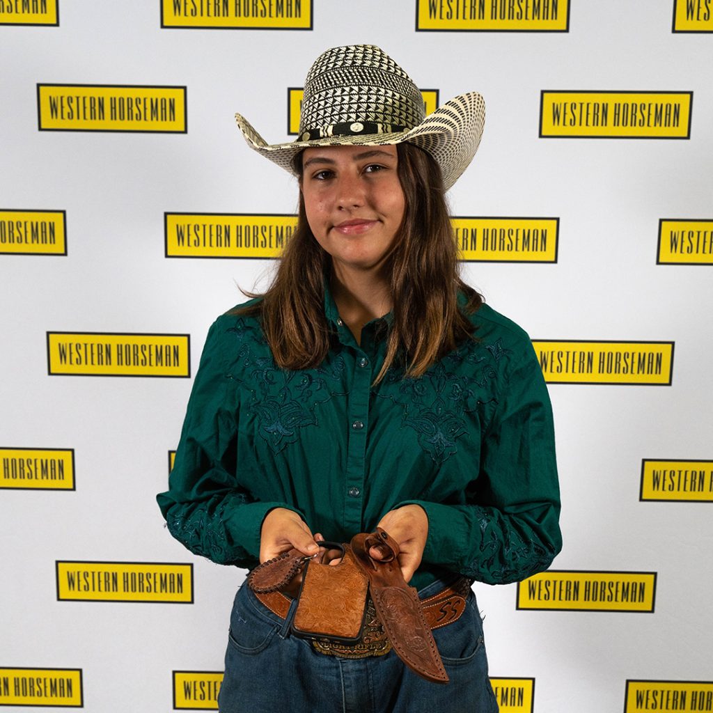 Annah Southern holding her Western Lifestyle Trade Craft Showcase entries.