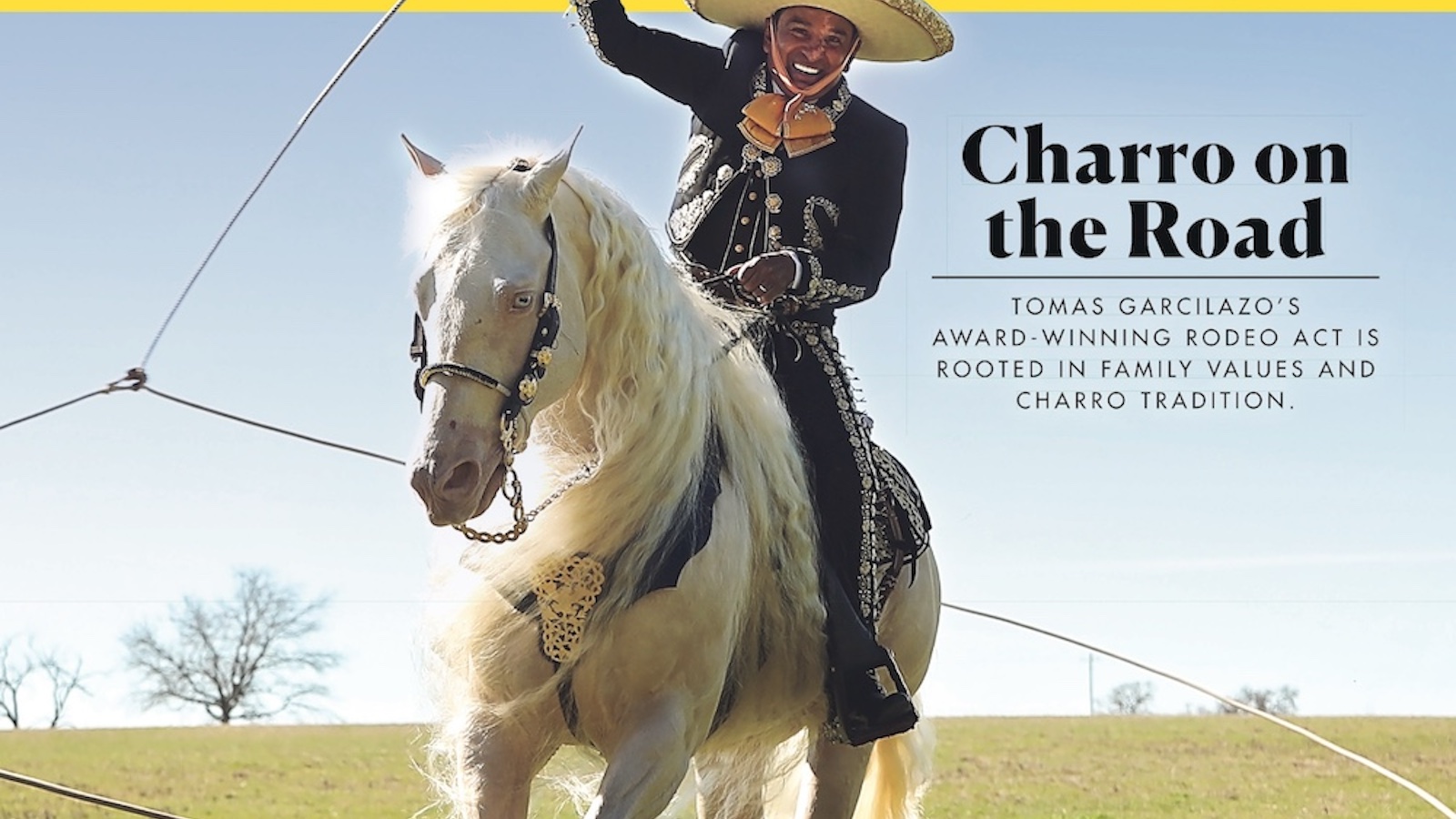 A man riding a horse with a large rope.