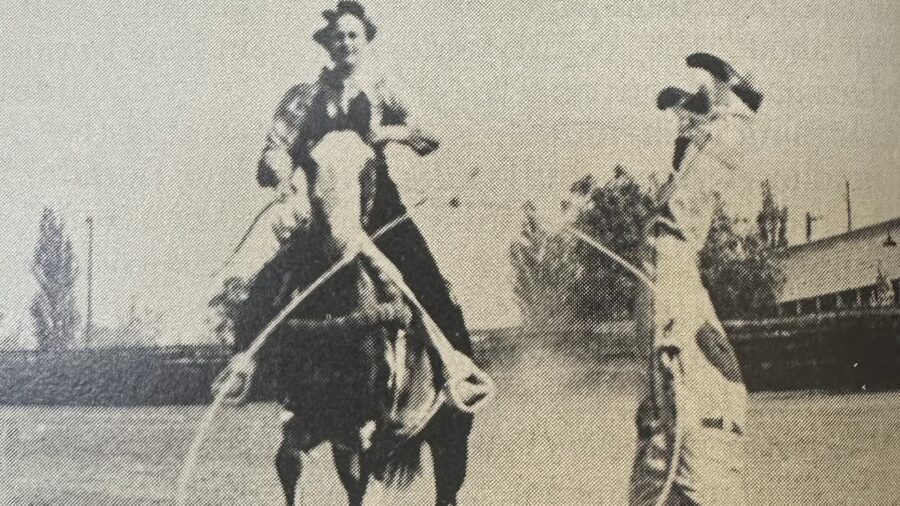 Frank Dean making a horse catch the hard way ... with his head in a bucket while trick riding