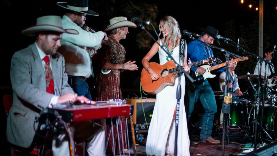 Olivia Harms singing at her wedding. Photograph courtesy of Olivia Harms.
