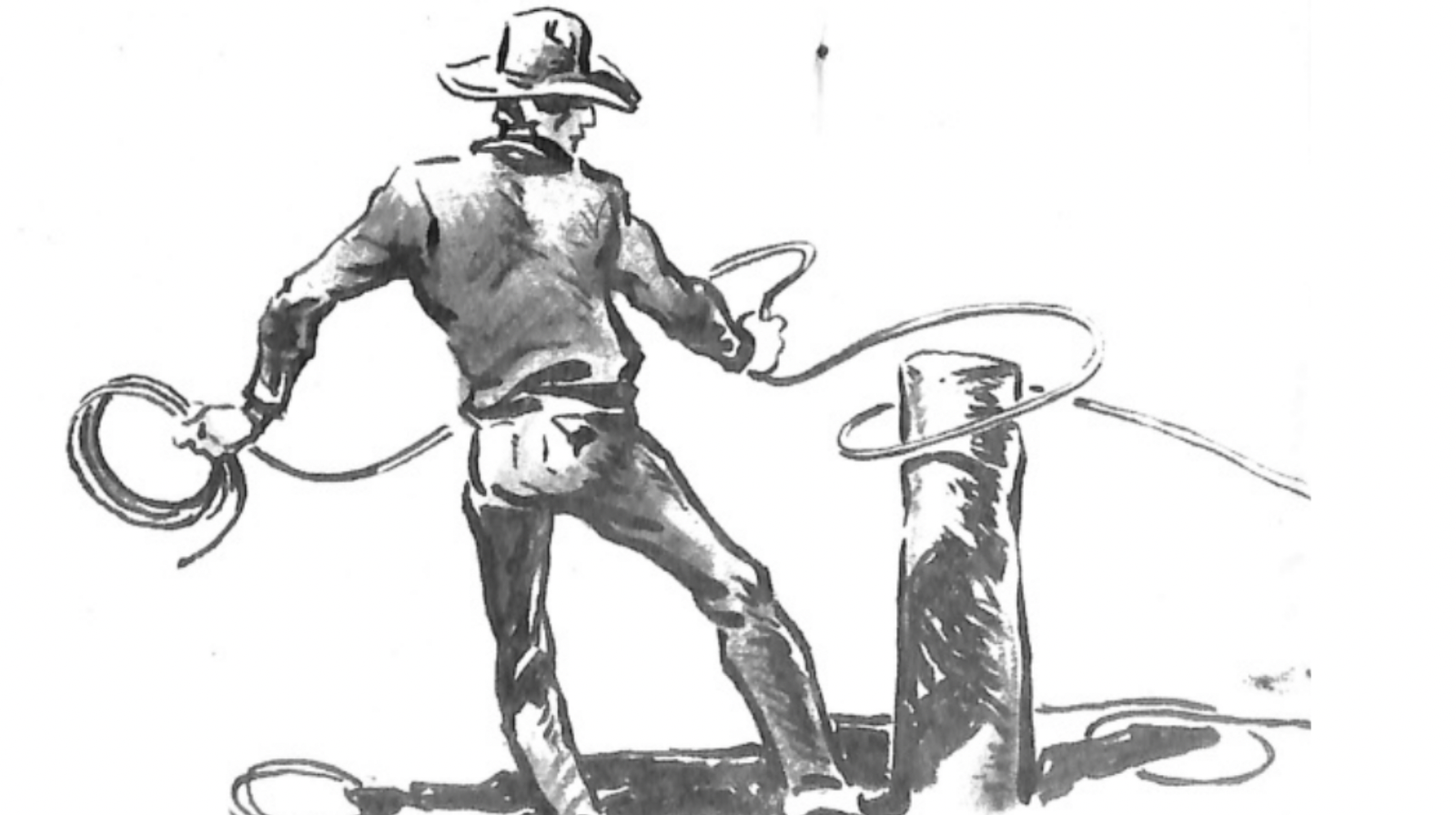 man with a rope around a corral