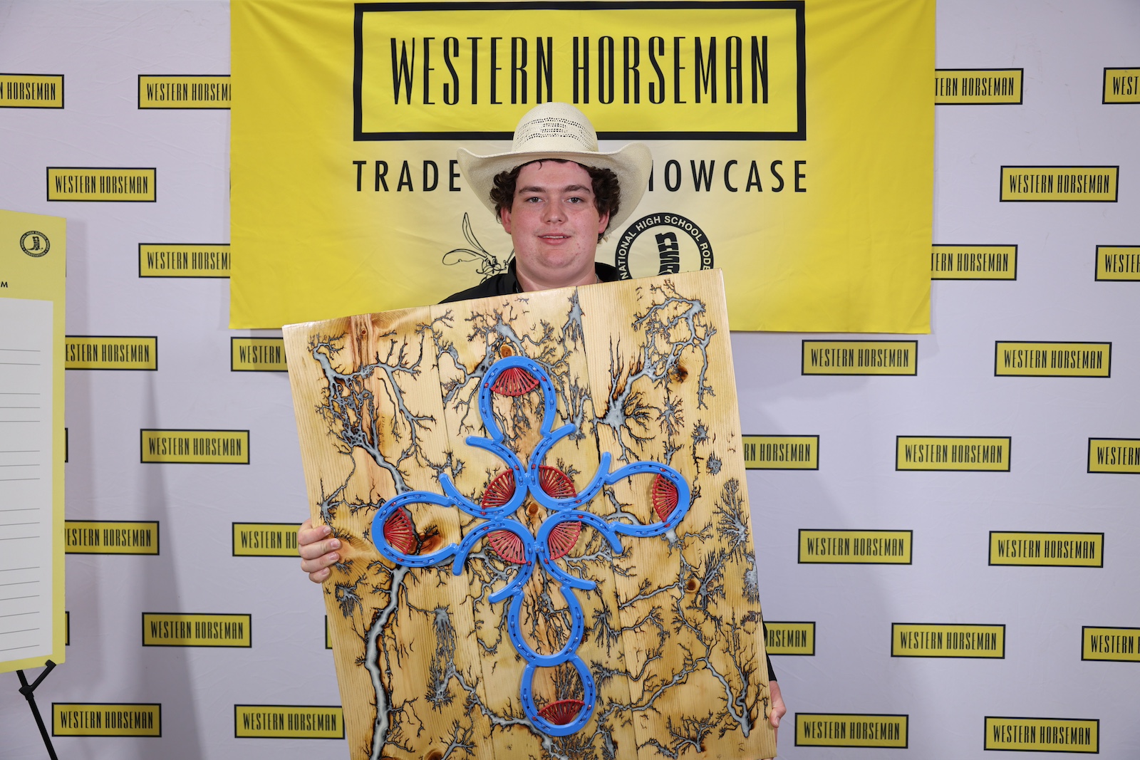 Vincent Patrick "Vince" Skinner with his Horseshoe Cross of Fractal Burnt board w/ horseshoe nail fans