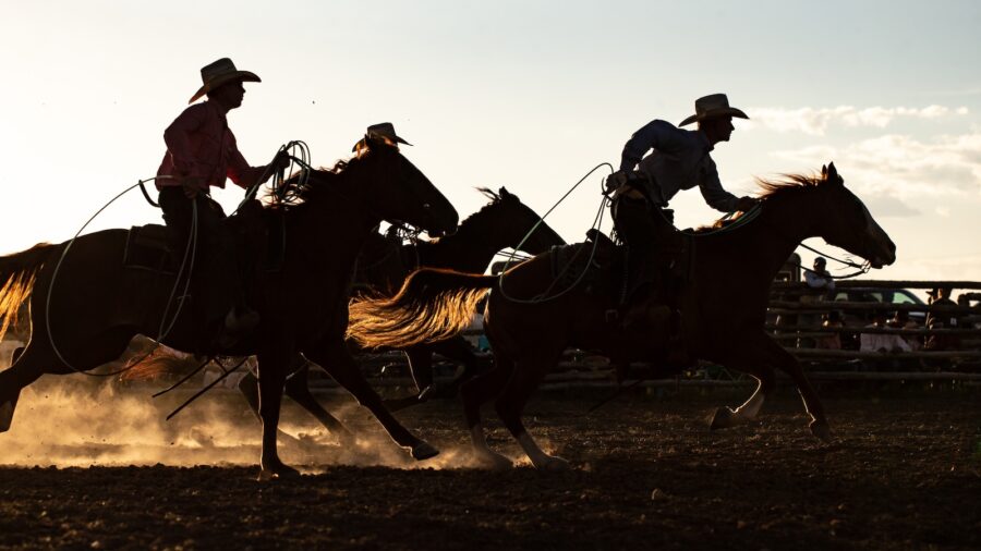 boys riding on horses after the grand entry at the West Texas Ranch Rodeo